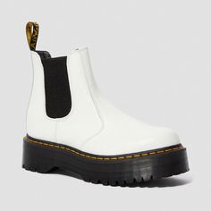 The First Dr. Martens Chelsea Boot Was Produced In The 70s, But The Actual Style Dates Back To The Victorian Era. Today, The 2976 Chelsea Boot Is A Slick, Uncompromisingly Fashion-Forward Look For All Genders And With A Sure Fit And An Easy-On, Easy-Off Elasticized Gusset, It's A Versatile Boot That Works With Everything. This Season, The Boot Gets An Empowering Boost From An Aggressive, 1 1/2 Inch Platform Sole And Now Comes In Show-Stopping White Smooth Leather. Elastic Gussets Pull-On Chelsea White Doc Martens Chelsea Boot, Doc Martens Platform Chelsea Boots Nordstrom, Retro White Leather Boots, White Doc Martens Platform, 2976 Max Leather Platform Chelsea Boots, White Leather Ankle-high Chelsea Boots, Dr Martens Chelsea, 2976 Chelsea Boots, Dr Martens 2976