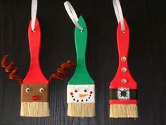 three christmas decorations made to look like toothbrushes