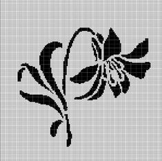 a cross stitch pattern with black and white flowers on it's side, in the shape of a flower