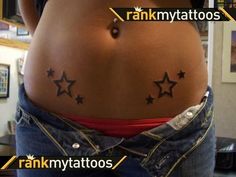 a woman's stomach with stars tattooed on her belly and the words rank my tattoos