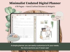 the minimalist undated digital planner is displayed on top of a wooden table with plants