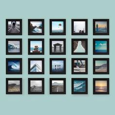 many different pictures are arranged in black frames on a blue wall, with one person standing and the other sitting