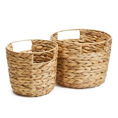 two woven baskets sitting next to each other