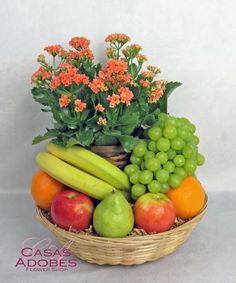 a basket filled with lots of different types of fruit