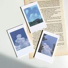 three polaroid photos sitting on top of an open book