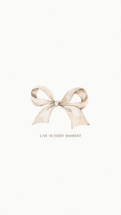 a white card with an image of a bow on it and the words live in every moment