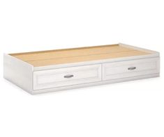 a white bed with two drawers on the bottom