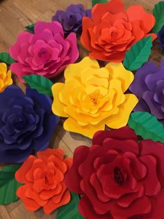 paper flowers are arranged on the floor