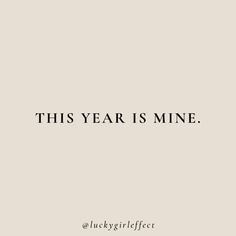 the words, this year is mine are in black and white on a beige background