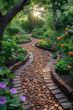 a stone path in the middle of a garden surrounded by trees and flowers with sun shining through