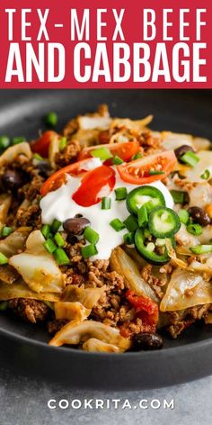 tex - mex beef and cabbage dish on a black plate