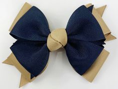 "4.5\" hair bow in a double layer pinwheel bow style. Back to school colors of navy blue and khaki. Custom colors available! Dark green version shown for size reference. CLIP OPTIONS Regular clip option: Non-slip 1.75\" single prong alligator clip partially lined with matching ribbon for baby / toddlers / little girls / fine hair Large clip option: 3\" long partially lined alligator clip with teeth and non slip: for big girls / thick or curly hair (Knot may be wrapped around clip for better hold Back To School Uniform, Navy Blue Uniform, School Bows, School Hair Bows, Pinwheel Bow, Bow Style, Hair Knot, Back To School Hairstyles, Navy And Khaki