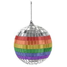 a multicolored ball ornament hanging from a metal wire on a white background