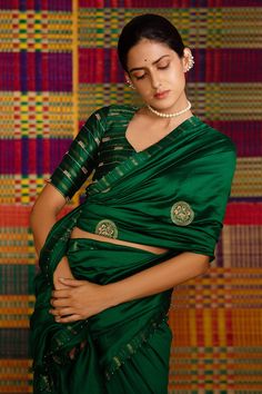 Emerald green haritah embroidered saree with mandala motifs. Comes with blouse.
Component: 2
Pattern: Embroidery
Type Of Work: Mandala
Sleeve Type: Half
Fabric: Maheshwari Silk
Color: Emerald Green
Other Details: 
Zari embroidery
Tassel detailing
Occasion: Wedding - Aza Fashions Mandala Motifs, Mandala Sleeve, Green Mandala, Zari Embroidery, Saree Navel, Embroidered Saree, Pattern Embroidery, Blouse For Women, Silk Embroidery