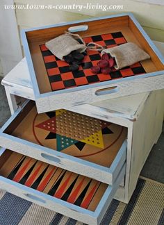 two wooden boxes are stacked on top of each other