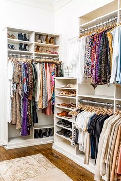 the closet is full of clothes and shoes