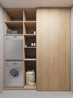 a washer and dryer in a wooden closet