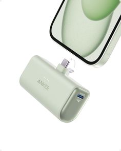 an external charger for the apple iphone is shown in this illustration, and it appears to be plugged into another device