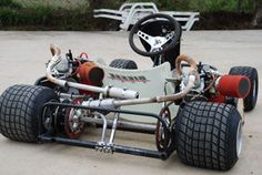 an electric race car is parked on the pavement