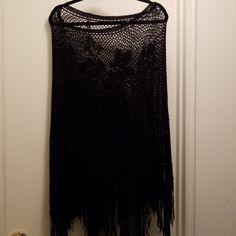 Never Used Just Stored In Closet Black Netted Shawl/Poncho W/Intricate Knit Rose Design, Fringe & Separation For Arms In One Size. Pet Smoke Free Home. Reasonable Offers Considered. Black Shawl Poncho For The Beach, Black One Size Poncho For Beach, Black Shawl Poncho For Beach, Black One Size Beach Poncho, Black Bohemian Poncho With Batwing Sleeves, Black Beach Poncho Shawl, Black Beach Poncho One Size, Black Shawl Poncho One Size, Black Fringed Shawl For Festival