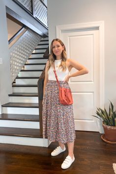 Outfit with a tank top, floral skirt, and white sneakers. Michelle Tomczak Blog. White Tank Top Outfit Summer, Skirt And White Sneakers, White Tank Top Outfit, Summer Tank Top Outfits, Trendy Dress Styles, White Sneakers Outfit, Mom Uniform, Sneaker Outfits Women, Tank Top Skirt