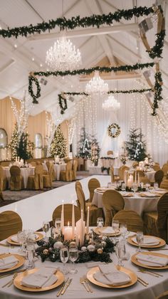 a banquet hall with tables and chairs set up for formal function, decorated in gold and white