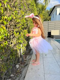 This is the cutest little Easter bunny you have ever seen. This dress comes with a pair of bunny ears, bow tie and bunny tail. It looks absolutely adorable on! White Tutu Dress For Easter Party, Fitted Pink Tutu Dress For Easter, Pink Fitted Tutu Dress For Easter, Cute Spring Tutu Dress For Costume Party, White Tutu Dress For Easter, Playful Tutu Dress For Spring Costume Party, Playful Spring Tutu Dress For Costume Party, Sleeveless Spring Tutu Dress For Costume Party, Playful White Dress For Costume Party