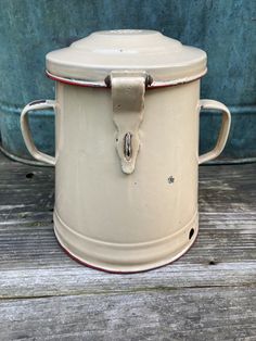 Has chips missing enamel and some rust spots. See photos Medium vintage tan with red "Bonyhad" enamelware lidded storage container from Hungary. This type of container was originally used to store food items in the kitchen. In today's home, it could be used to stylishly hide items or as a statement planter for your garden.. A highly collectible enamelware piece in a wonderful color and in good vintage condition Farmhouse French Country Rustic Antique Enamelware, Potato Bin, Compost Container, Flour Container, French Country Rustic, Farmhouse French Country, Store Food, Lid Storage, Old Antiques