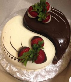 a cake with chocolate and strawberries on top