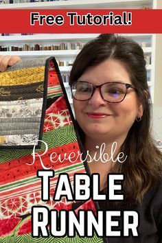 a woman holding up a table runner with the text free printable reversible table runner