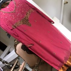 Beautiful Brand New Chiffon 3piece Set With Dull Gold Embroidery. Bust 22" Shoulder 16" Embellished V-neck Kurta For Party, Pink Anarkali V-neck Set, Bollywood Style Pink V-neck Sets, Pink Bollywood V-neck Sets, Pink Sequined Kurta For Eid, Pink V-neck Dress With Dupatta, Fitted V-neck Kurta For Party, Traditional V-neck Party Sets, Fitted V-neck Party Kurta