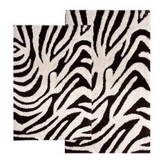 two black and white zebra print rugs