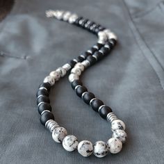 If you are looking for the 8mm Black Onyx and Quartz and Hematite Beaded Necklace, this necklace is for you! If you are looking for a gift necklace for your boyfriend, brother, father or husband, this necklace is for you! Quartz Choker Necklace for Men; - 8mm Matte Onyx beads. - 8mm Gray Patterned Quartz beads. - 6mm Hematite. - Silver color lobster clasp. - Choker Necklace is made of Stainless Steel Wire. -The necklace length you see in the pictures is 16 inches. - Necklace length 14" to 32"+ 1 Mens Beaded Necklace, Mens Mala Necklace, Beaded Necklace Ideas, Mens Necklaces, Quartz Choker, Mens Beaded Necklaces, Necklaces For Men, Gemstone Necklaces, Necklace Men