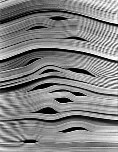 stacks of papers stacked on top of each other