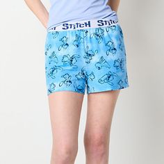 Sleep soundly knowing you are in the comfort of this pair of junior's and women's graphic pajama shorts from Disney featuring the lovable alien, Stitch. They are made from soft stretch-jersey with an embroidered elastic waistband for easy on-and-off.# Pieces In Set: 1 PairFeatures: Comfort WaistbandCharacter: StitchClosure Type: Full ElasticApparel Length: 18.75 InchesFiber Content: 95% Polyester, 5% SpandexFabric Description: JerseyInseam: 3 In Care: Machine Wash, Tumble DryCountry of Origin: I Womens Pajama Shorts, Stitch Disney, Pajama Shorts, Pajamas Women, Back To School, Pajamas, Color Blue, Disney, Blue