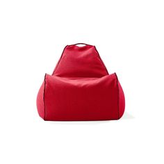 a red bag sitting on top of a white floor