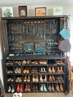 a shoe rack filled with lots of jewelry