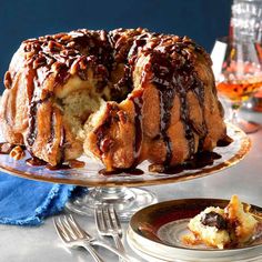 a bundt cake with chocolate drizzled on top