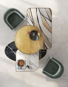 an overhead view of a table and chairs with marbled surfaces on the floor,