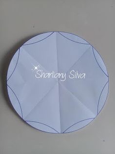 an origami paper plate with the name shantany siva on it