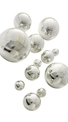 Silver plated glass ball mounted on the wall. Recycled Glass, Creative Decor