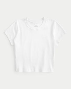 A super soft baby tee designed with a slightly shrunken silhouette. Crew neckline, short sleeves. Slim Fit.This item is available in extended lengths:Short - 17"Regular - 19"Long - 21" White Baby Tee, Winter Fits, Basic Tops, Fall 2024, White Tee, Christmas Wishlist