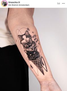 a person with a cat tattoo on their arm holding an ice cream cone and knife