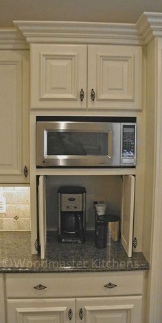 the microwave is built into the cabinet above the coffee maker