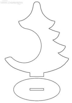 a paper cut out of a christmas tree with the letter c on it's base