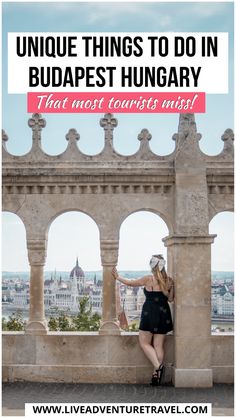 a woman leaning against a wall with the words unique things to do in budapest hungarian