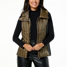 Curations x Nicole Hickl Quilted Puffer Vest with Faux Leather Detail  Super-practical and pretty stylish too, Nicole Hickl's Curations puffer vest is a cold-weather layer we love. Its quilted and filled design delivers cozy warmth, while its leather-inspired panels create a silhouette that's streamlined, eye-catching. This one's bound to become a three-season fave. Quilted Puffer Vest, Trim Styles, Leather Detail, Draped Fabric, Puffer Vest, Black Faux Leather, Outerwear Jackets, Leather Trims, Cold Weather