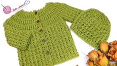 a crocheted green sweater and matching hat are shown next to autumn leaves on a white background