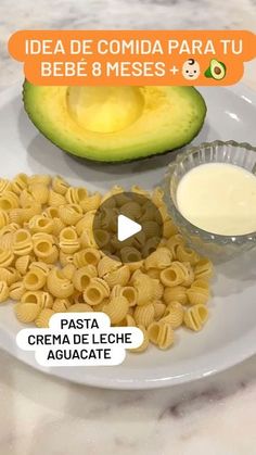 an avocado and pasta on a white plate with the words idea de comida para tu bebe 8 messes