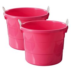 two pink plastic buckets with rope handles on each side and one in the middle